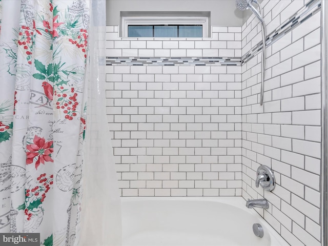 bathroom featuring shower / tub combo