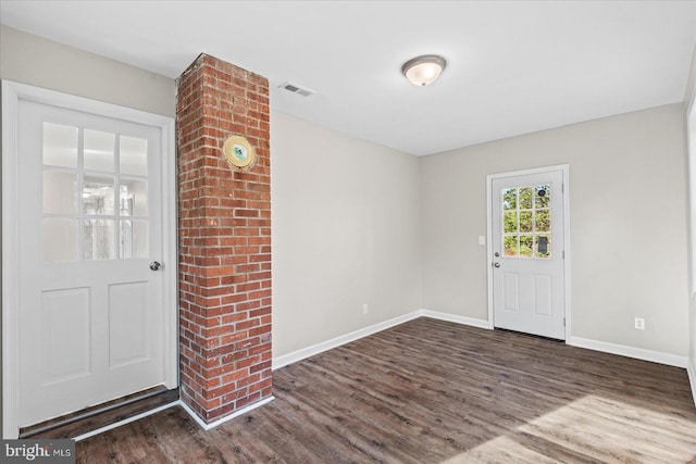 foyer featuring dark wood-type flooring