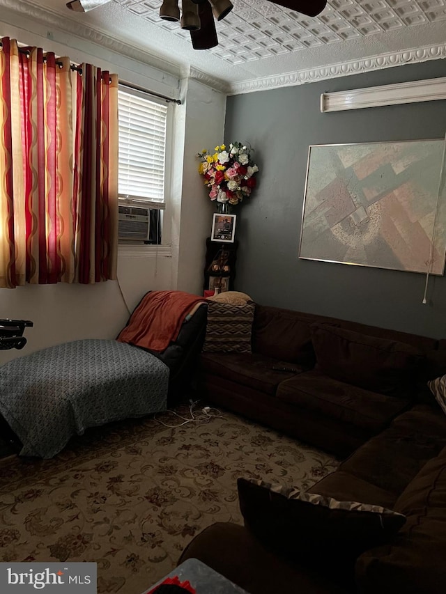 interior space with ceiling fan