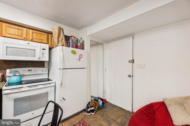 kitchen featuring white appliances