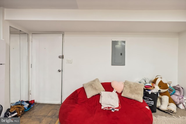 bedroom featuring electric panel