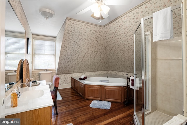 bathroom with vanity, hardwood / wood-style floors, separate shower and tub, and ceiling fan