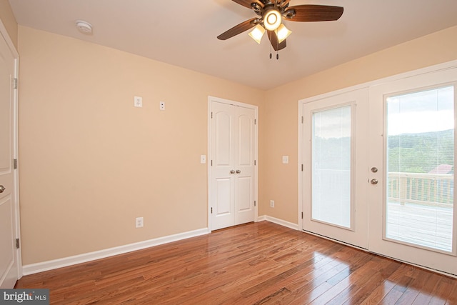 interior space featuring french doors, ceiling fan, and hardwood / wood-style floors