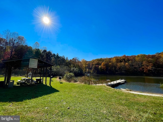 view of yard featuring a water view and a gazebo