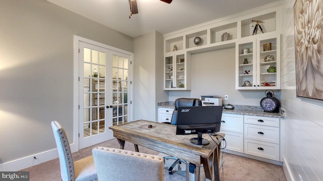 office area with light carpet, french doors, and ceiling fan