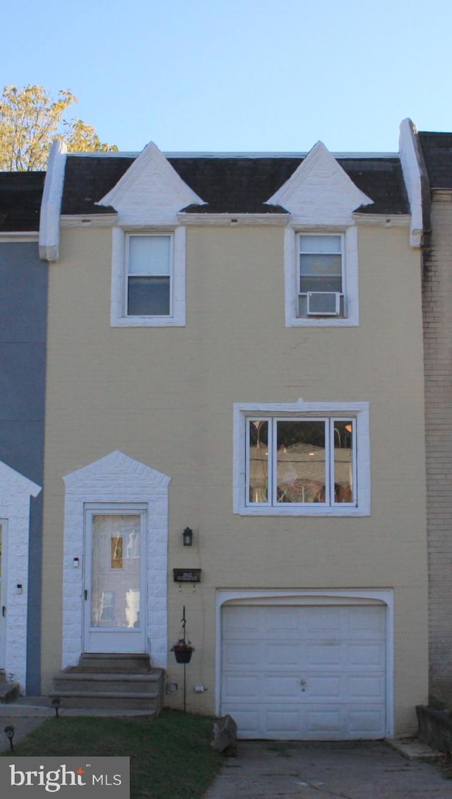 view of property featuring a garage