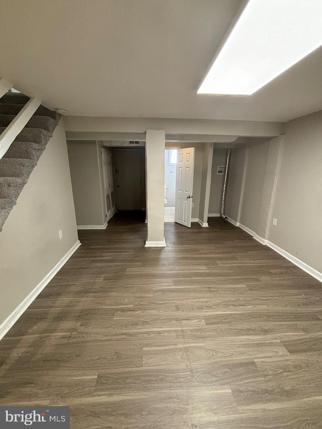 basement featuring hardwood / wood-style flooring