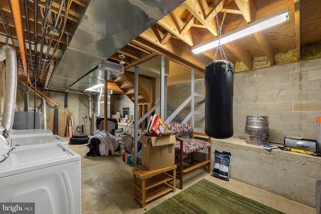 basement with washer and clothes dryer