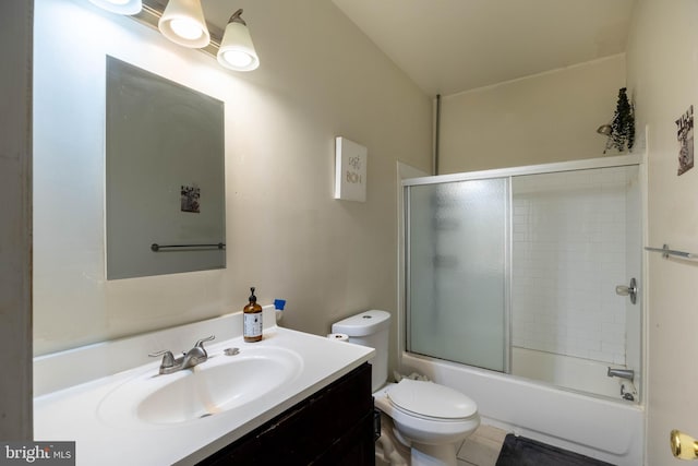 full bathroom with toilet, vanity, shower / bath combination with glass door, and tile patterned flooring