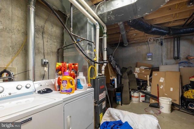 laundry area with separate washer and dryer