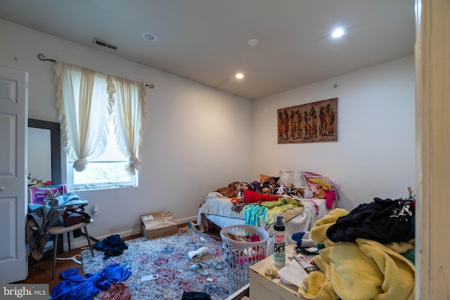 bedroom featuring hardwood / wood-style flooring