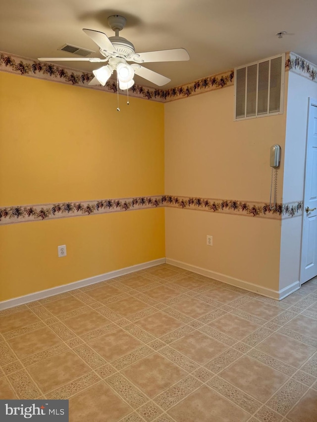 empty room featuring ceiling fan