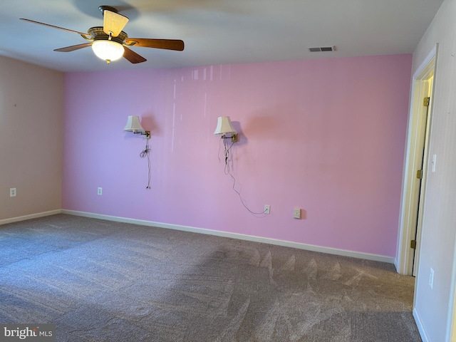 empty room with carpet and ceiling fan