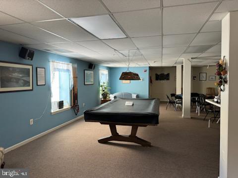 recreation room featuring a paneled ceiling, carpet flooring, and billiards