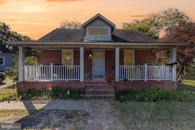 view of front of house with covered porch