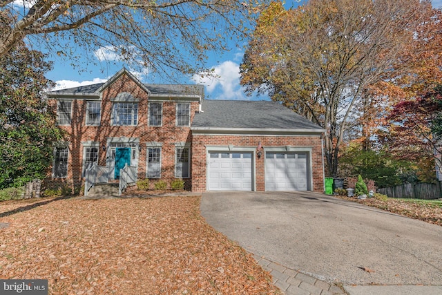 colonial home featuring a garage