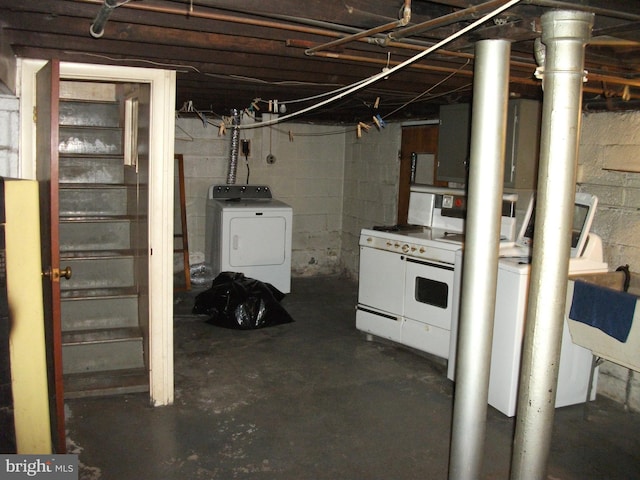 basement with washer and dryer and sink