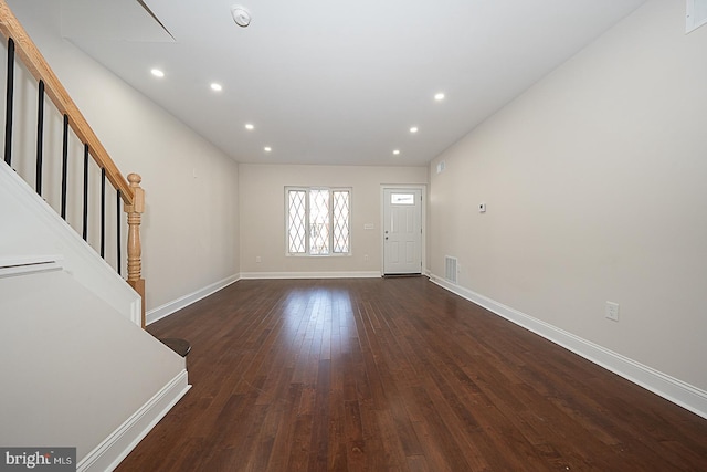 foyer entrance featuring dark hardwood / wood-style flooring