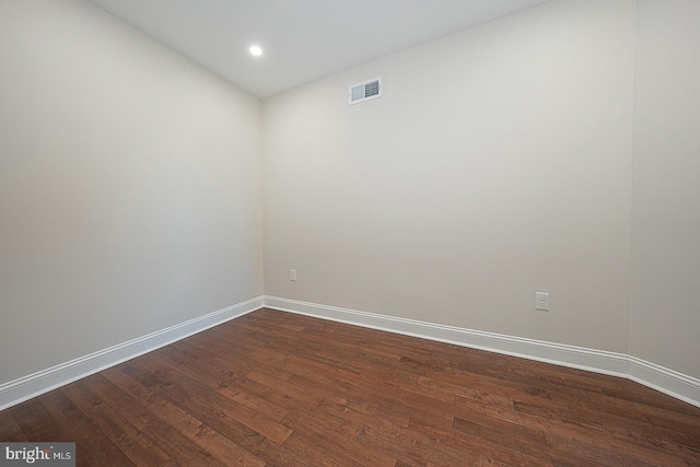 empty room with wood-type flooring