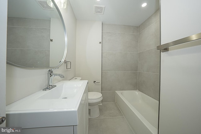 full bathroom featuring vanity, toilet, shower with separate bathtub, and tile patterned flooring