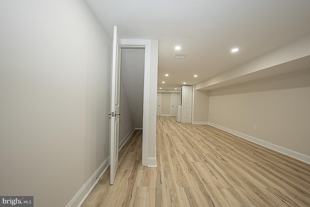 basement with light wood-type flooring