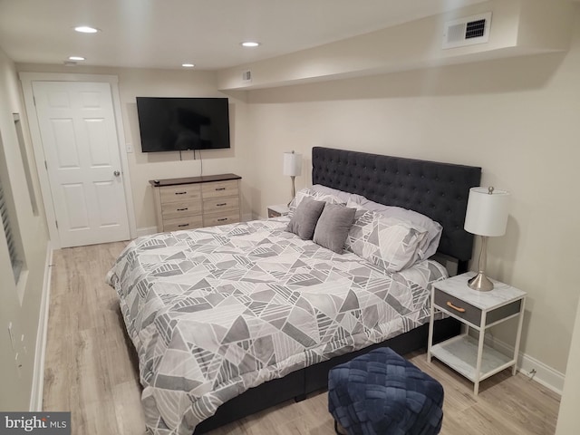 bedroom featuring light hardwood / wood-style flooring