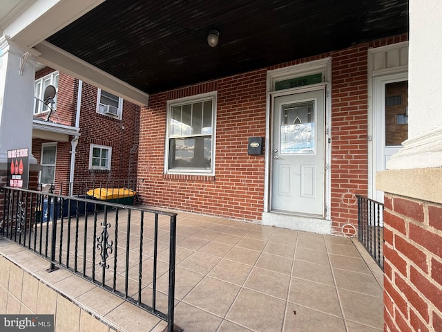 doorway to property with cooling unit