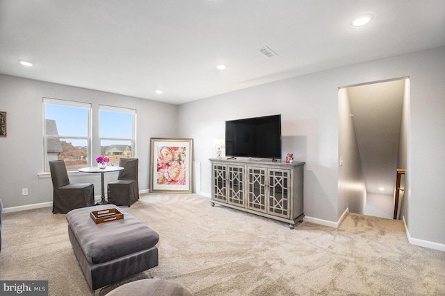 living area with carpet flooring