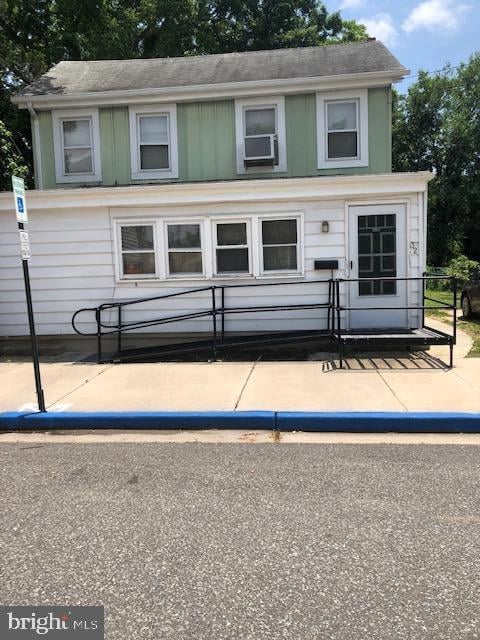 view of front of house with cooling unit