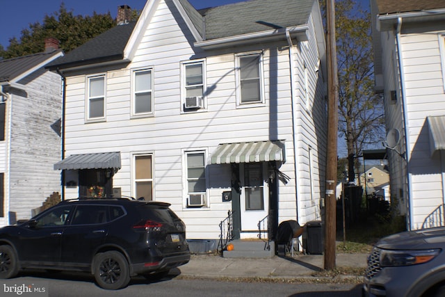 view of front of home featuring cooling unit