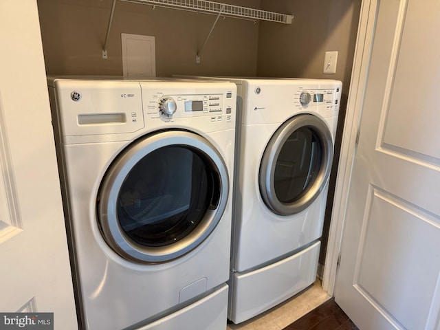 laundry room with washer and dryer