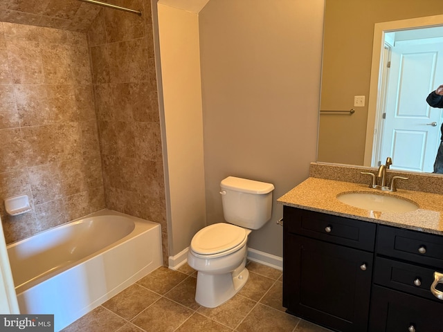 full bathroom with toilet, vanity, tile patterned floors, and tiled shower / bath combo