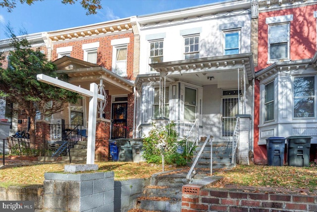 view of property with covered porch