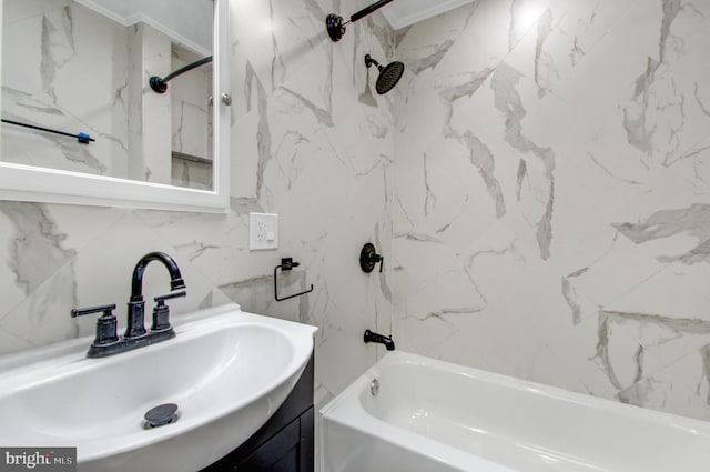 bathroom with vanity, tiled shower / bath combo, tile walls, and backsplash