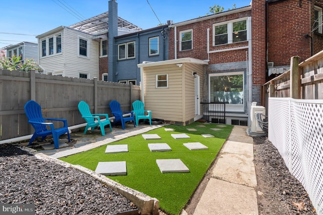 rear view of house with a patio