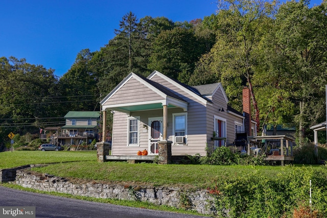 bungalow with a front yard