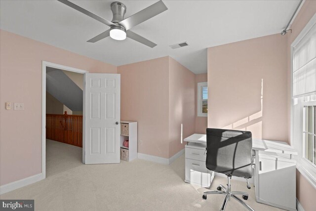 office area with light carpet and ceiling fan