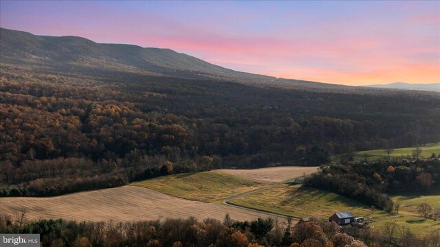 aerial view at dusk with a mountain view