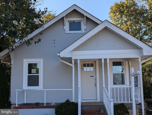 bungalow-style home featuring covered porch