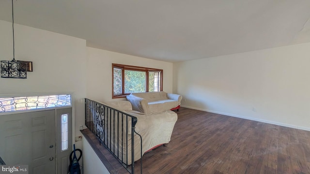 living room with dark wood-type flooring