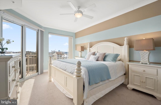 bedroom featuring light carpet, multiple windows, and access to exterior