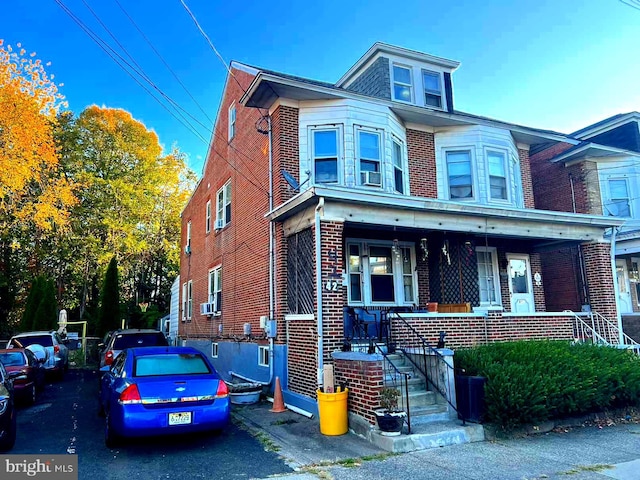 multi unit property featuring covered porch