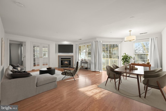 dining area featuring light wood-type flooring