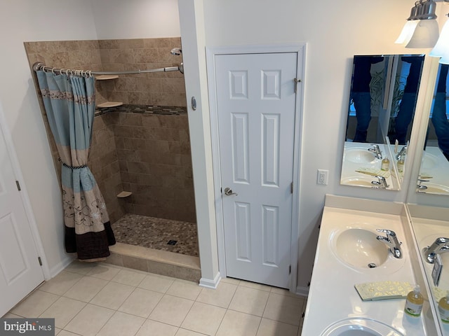 bathroom with vanity, tile patterned floors, and a shower with curtain