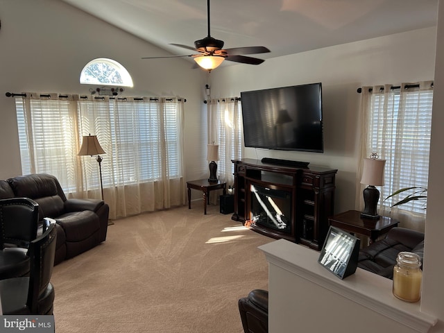 carpeted living room featuring ceiling fan