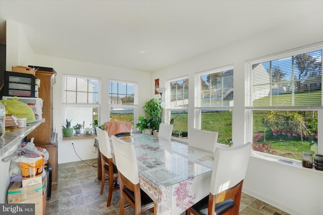 sunroom featuring plenty of natural light