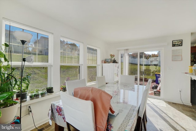 sunroom featuring a wealth of natural light