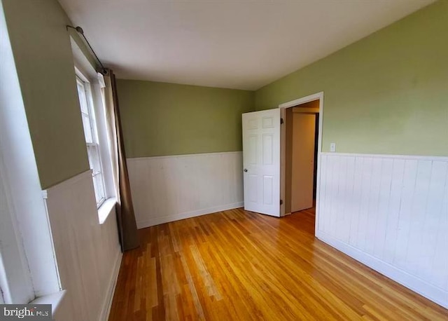 spare room featuring light hardwood / wood-style floors