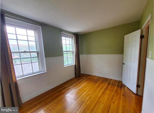 empty room featuring hardwood / wood-style floors