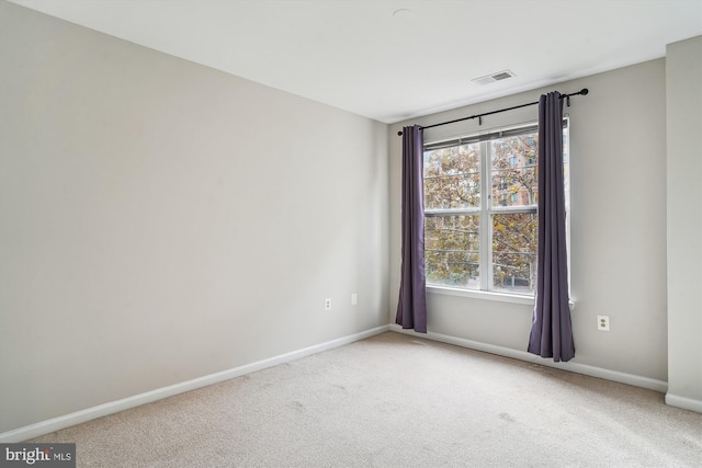 unfurnished room with carpet floors